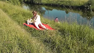MILF sexy Frina on river obstacle defoliate and sunbathes naked&period; Random man fisherman watching for her&comma; and in the end decided to enlarge naked woman&period; Wild beach&period; Nudist beach&period; Public nudity&period; Public exposure&period