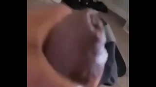 Masturbating